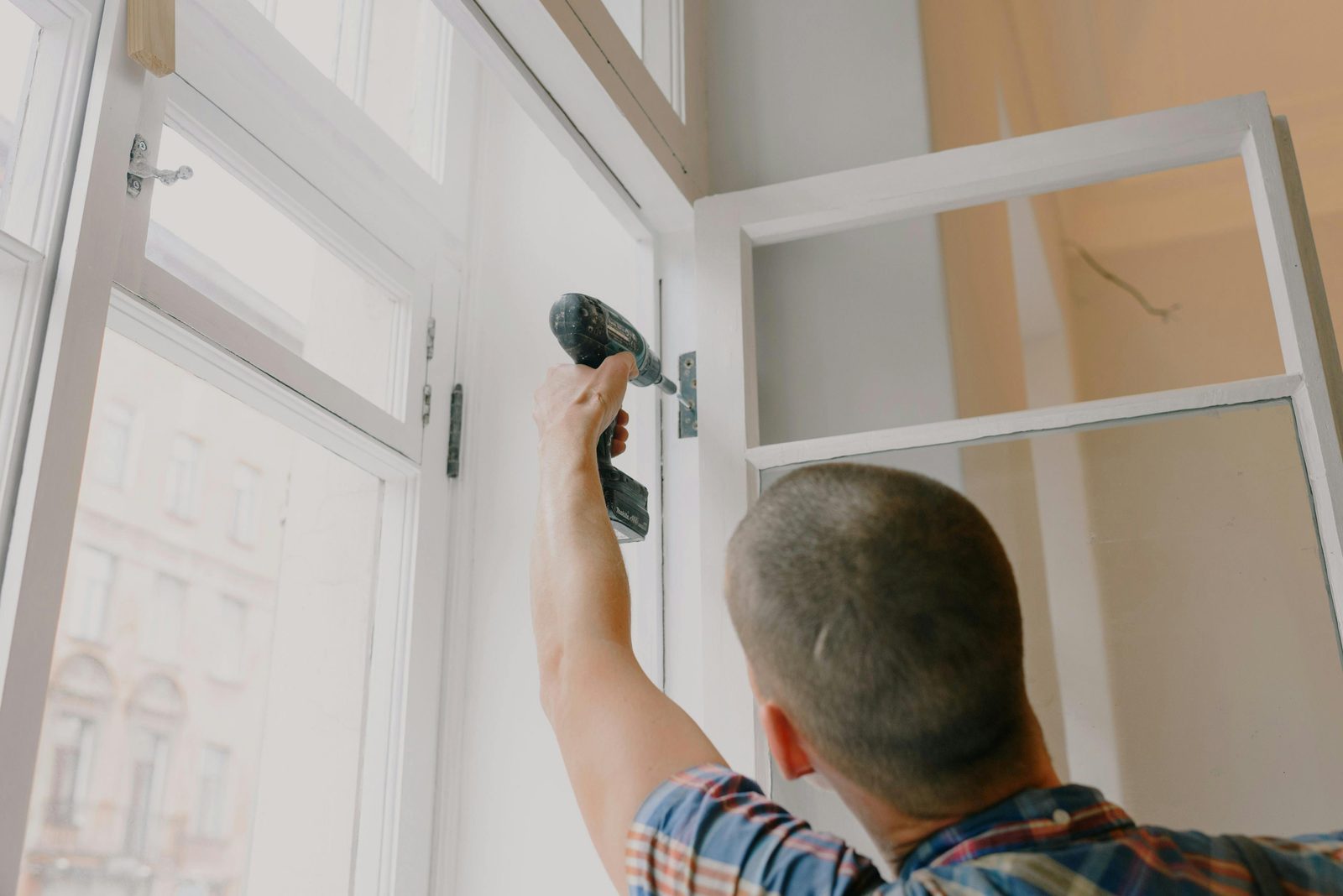 Neighbor helping with home repairs